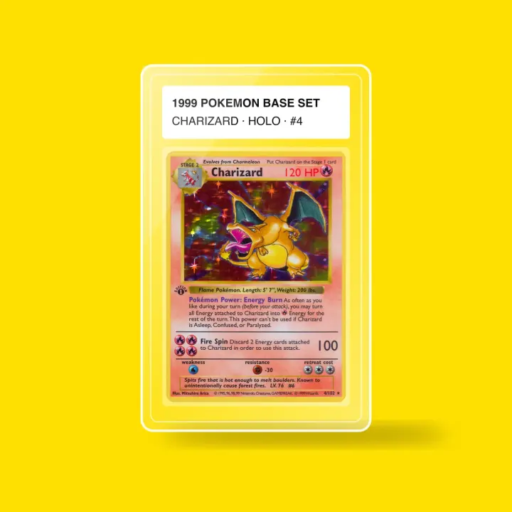 A graded card in a clear slab on a yellow background